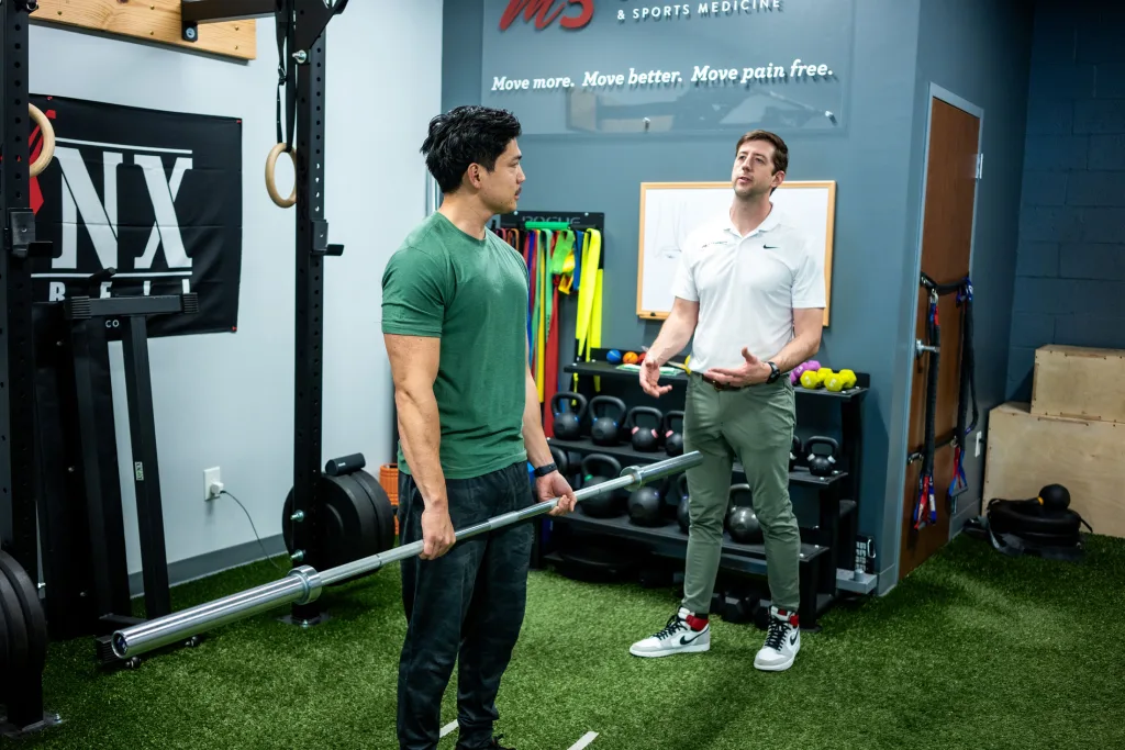 Patient lifting a barbell