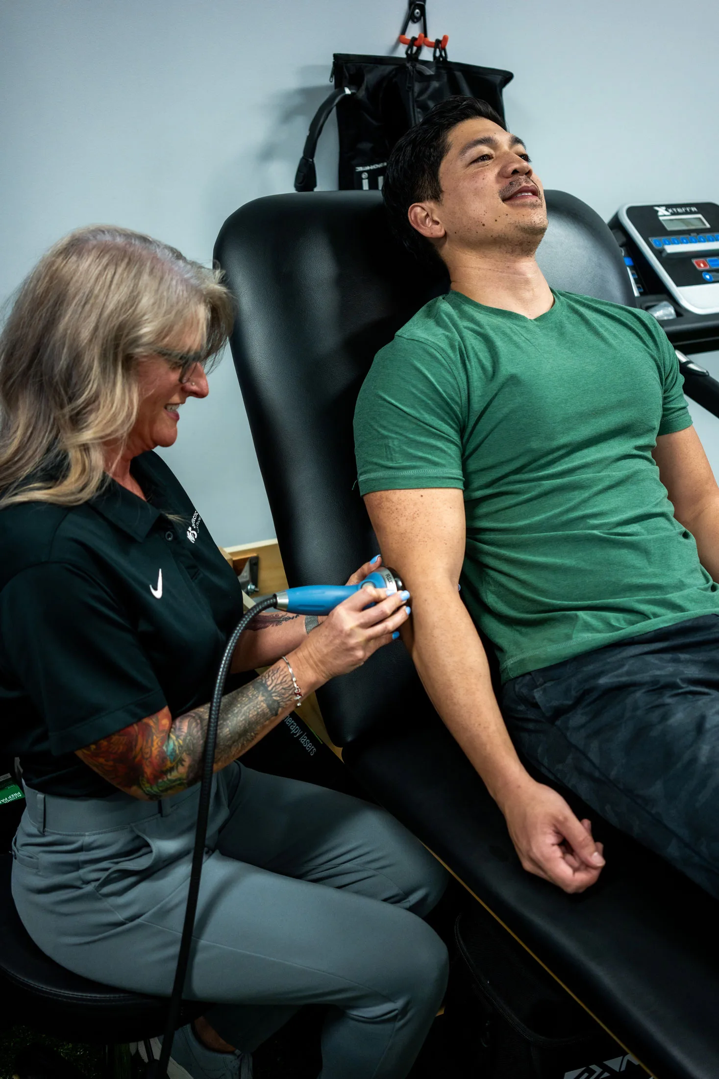 Benefits of Focused Shockwave Therapy Patient receiving shockwave treatment on elbow