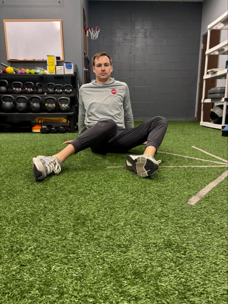 Seated controlled hip drops